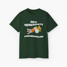 Green t-shirt with 'Anti Depressants, Xanashmallow' text, depicting an open remedies box filled with marshmallows, alongside a tent and trees.