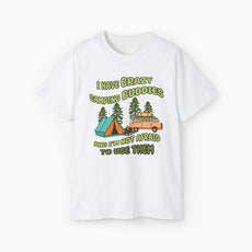 White t-shirt with the text 'I have crazy camping buddies and I am not afraid to use them,' featuring a camping van, campfire, trees, and a tent.