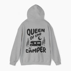 Back of a grey hoodie with the text 'Queen of the Camper' surrounded by elements including a camping van, stars, trees, and a campfire, on a plain background.