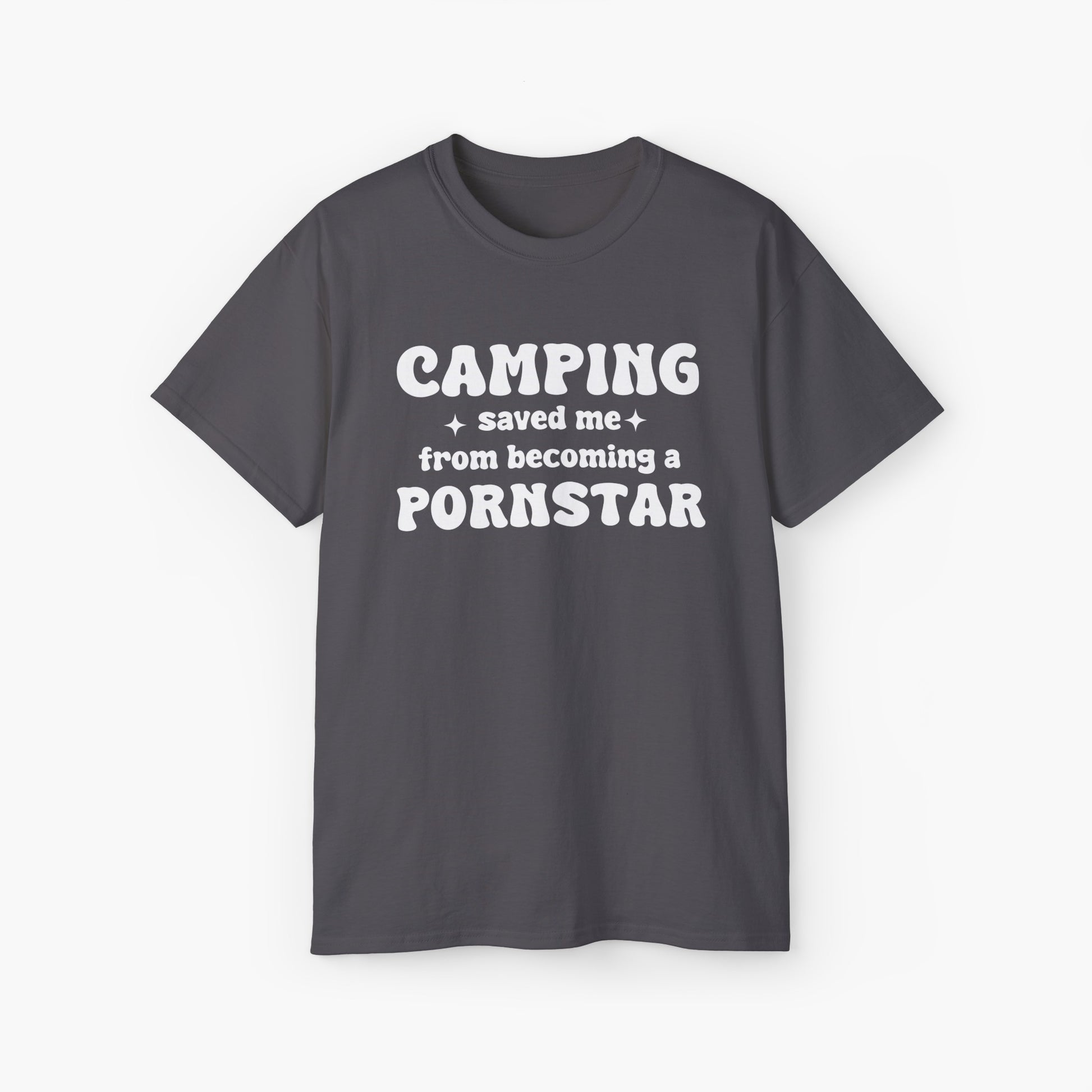 Dark grey t-shirt with the bold statement 'Camping saved me from becoming a pornstar,' embellished with stars on a plain background.
