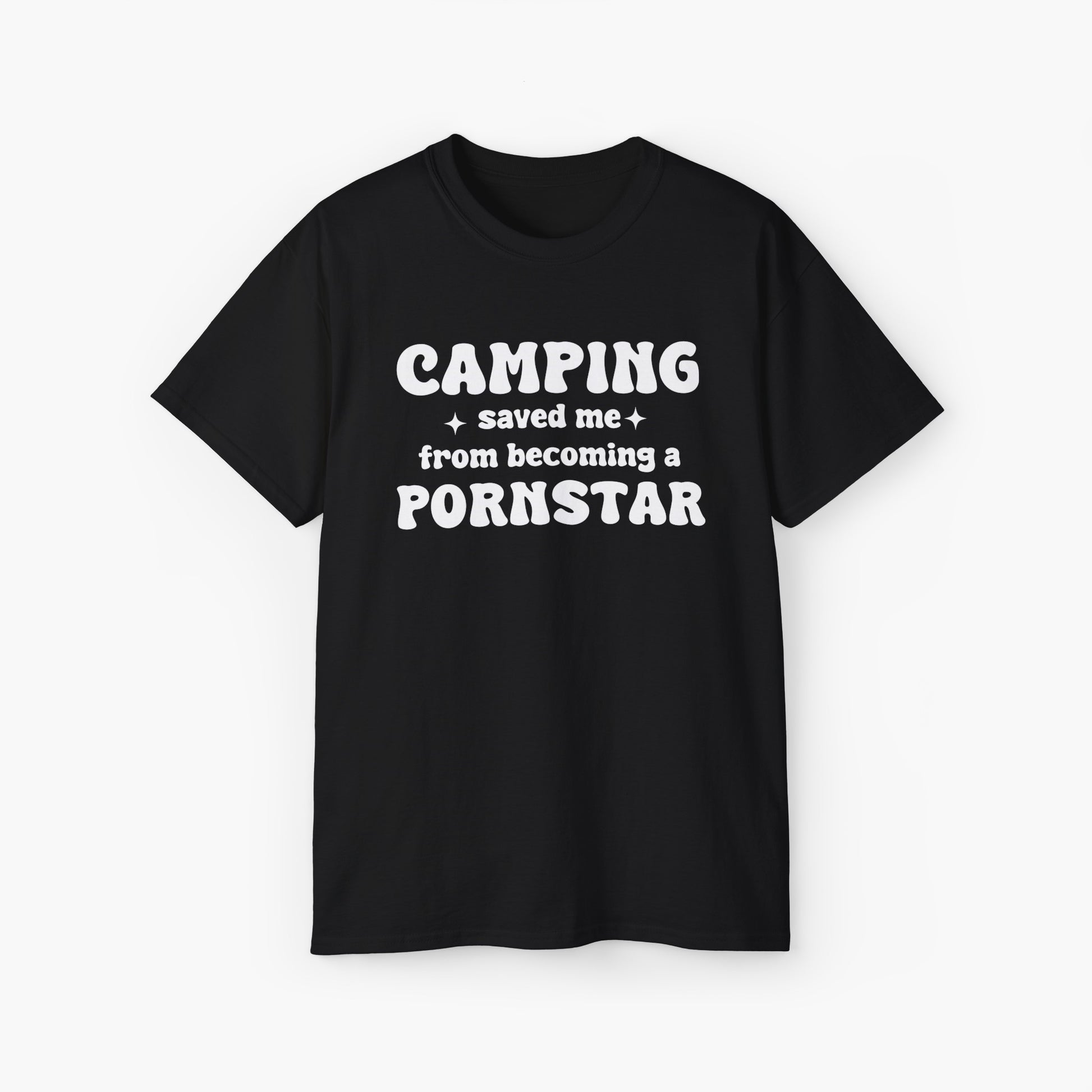 Black t-shirt with the bold statement 'Camping saved me from becoming a pornstar,' embellished with stars on a plain background.