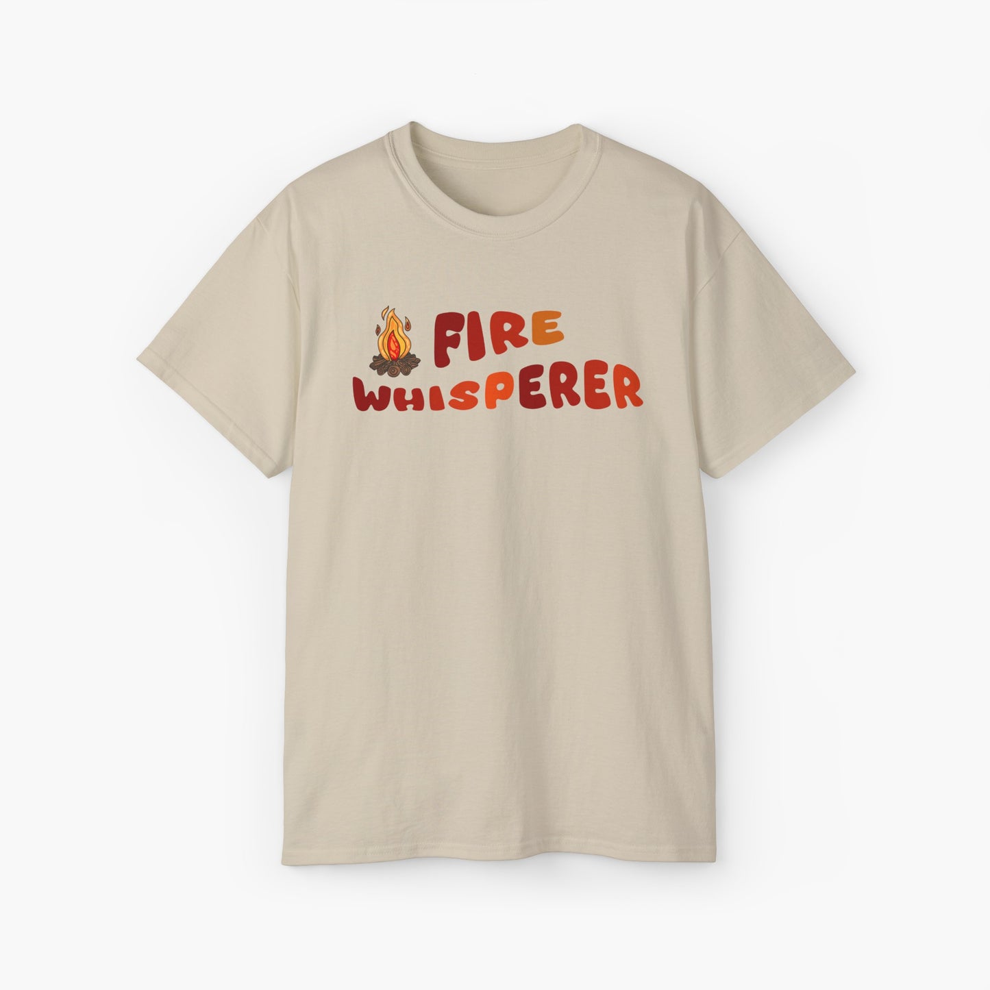 Sand color t-shirt with colorful 'Fire Whisperer' text, featuring a vibrant campfire graphic on a plain background.