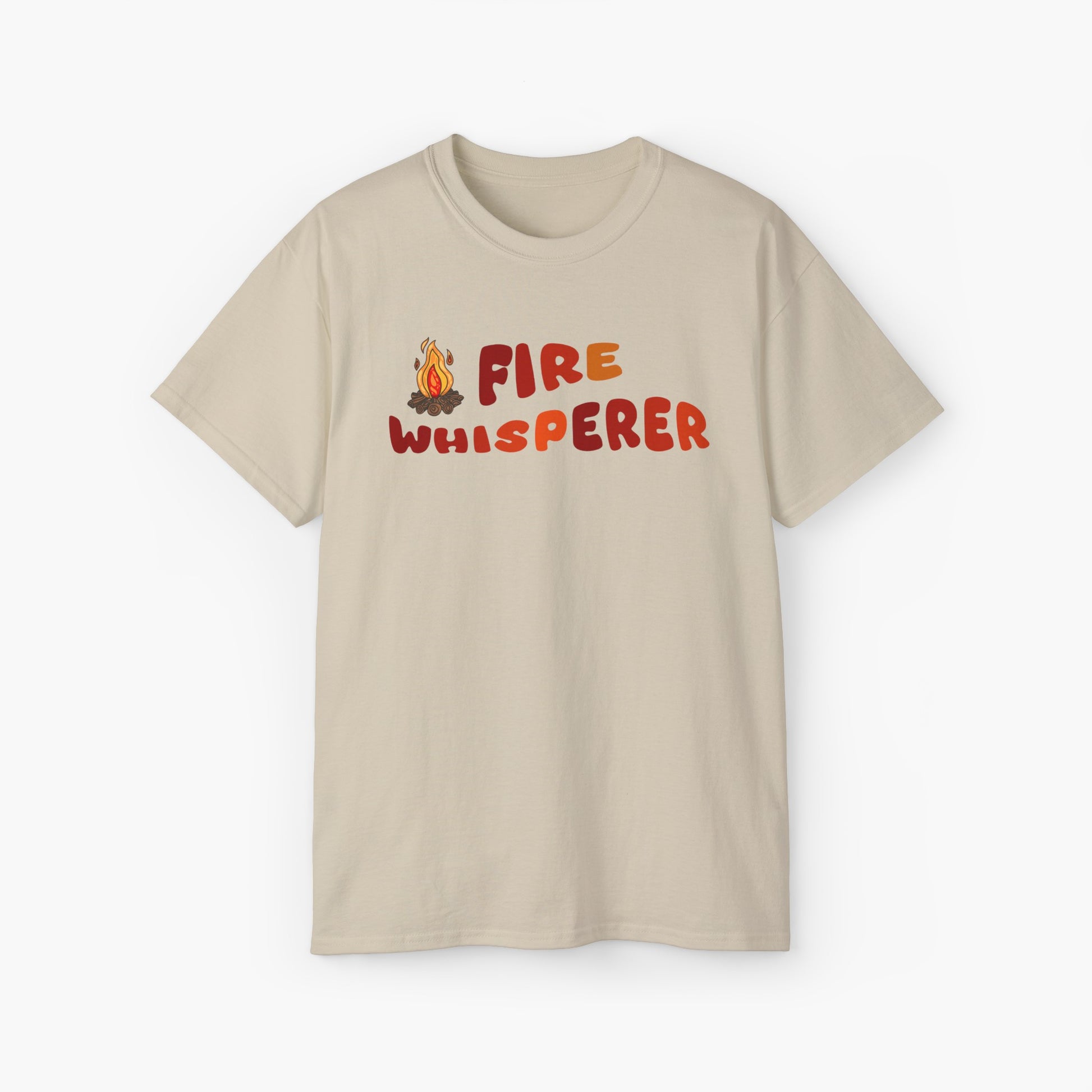 Sand color t-shirt with colorful 'Fire Whisperer' text, featuring a vibrant campfire graphic on a plain background.