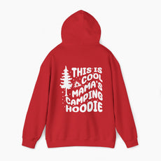 Red hoodie with the text 'This is cool mama's camping hoodie' on the back, featuring a tree and stars design on a plain background.