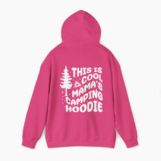 Pink hoodie with the text 'This is cool mama's camping hoodie' on the back, featuring a tree and stars design on a plain background.