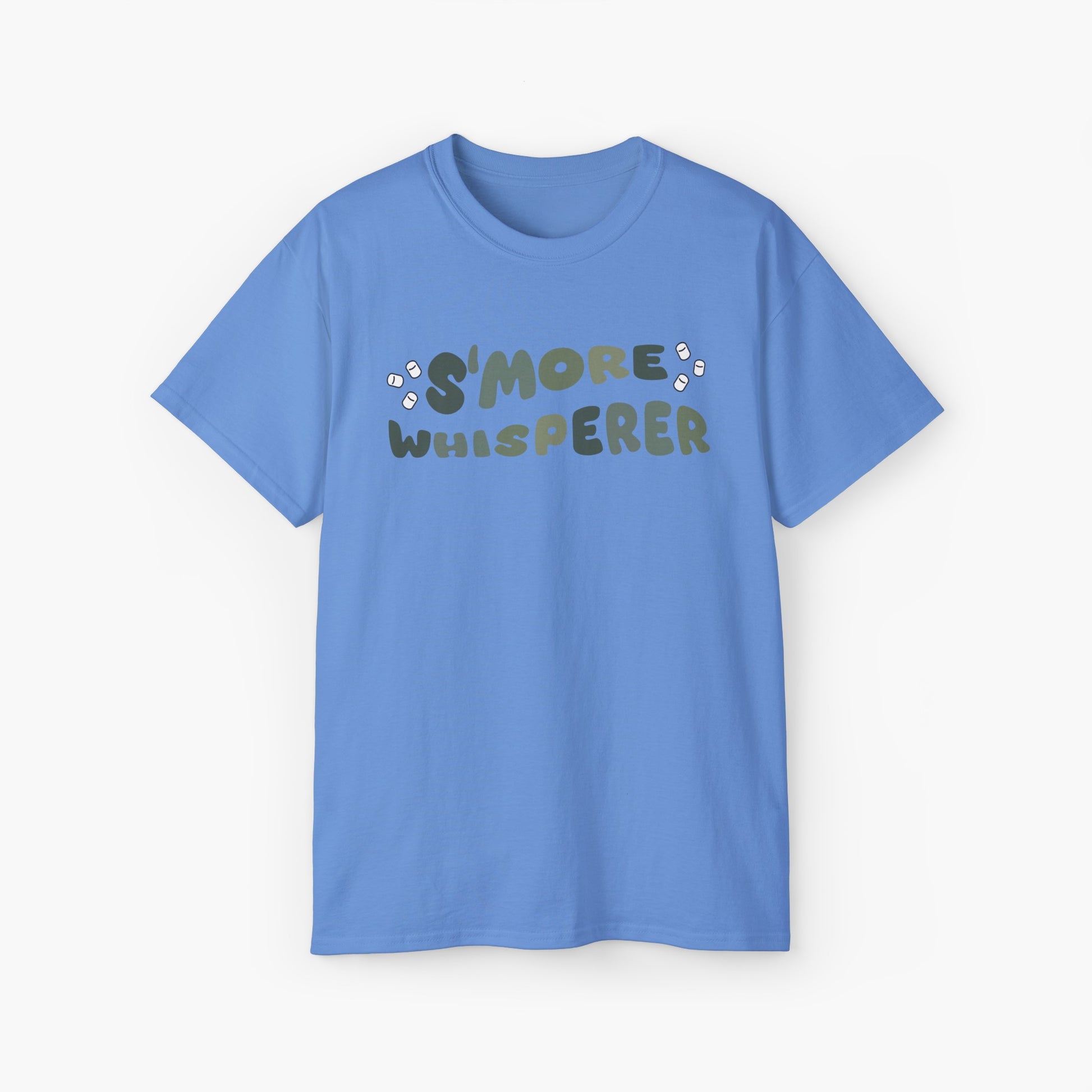 Blue t-shirt with green text 'S'more Whisperer' and marshmallow graphics on a plain background.