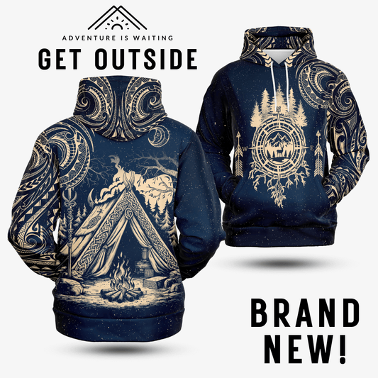 Two views of a navy blue camping hoodie featuring a detailed campfire and tent design on the back and a compass print on the front.