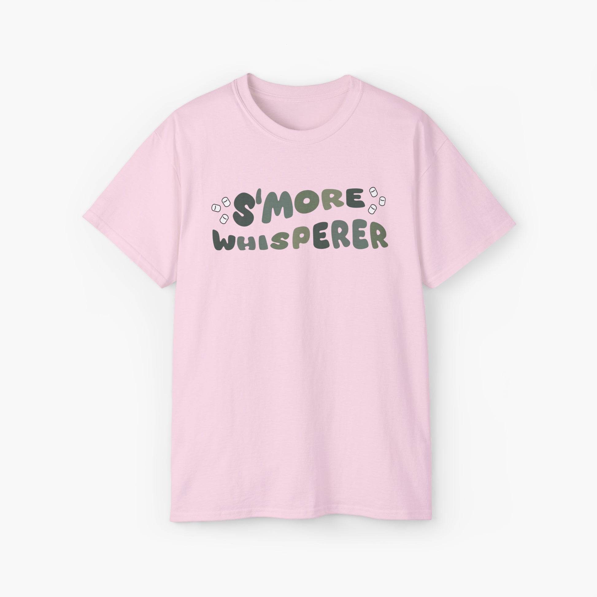 Light pink t-shirt with green text 'S'more Whisperer' and marshmallow graphics on a plain background.