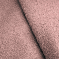 Close-up of soft, brushed fleece interior fabric in brown, showcasing the warm and cozy lining used inside the “Stay Wild” hoodie.